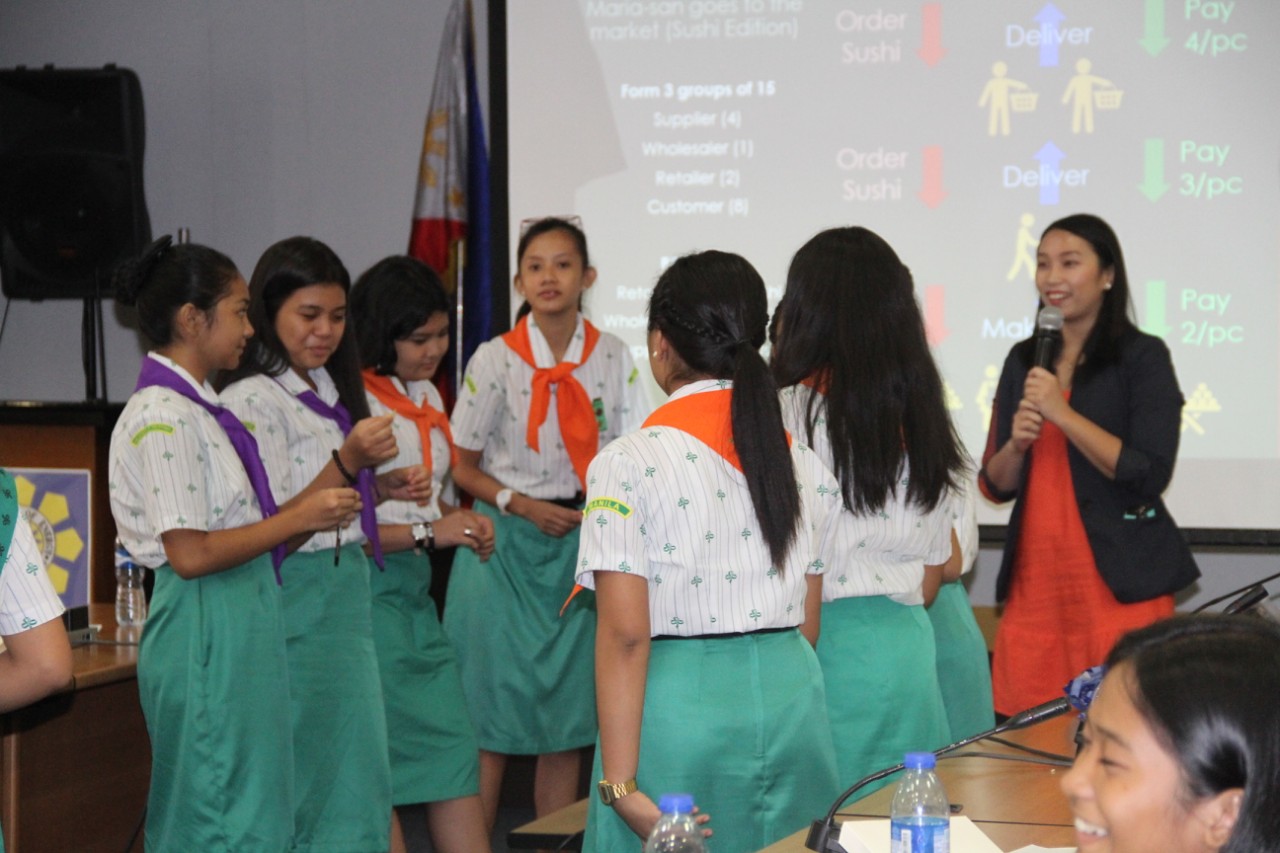 Girl scouts listen intently to a lady speaker as she shares her experiences in a job predominantly associated with and held by men. The ENEReady activity which encourages young participants to pursue their ambitions without regard to gender stereotypes was held on 11 July. 