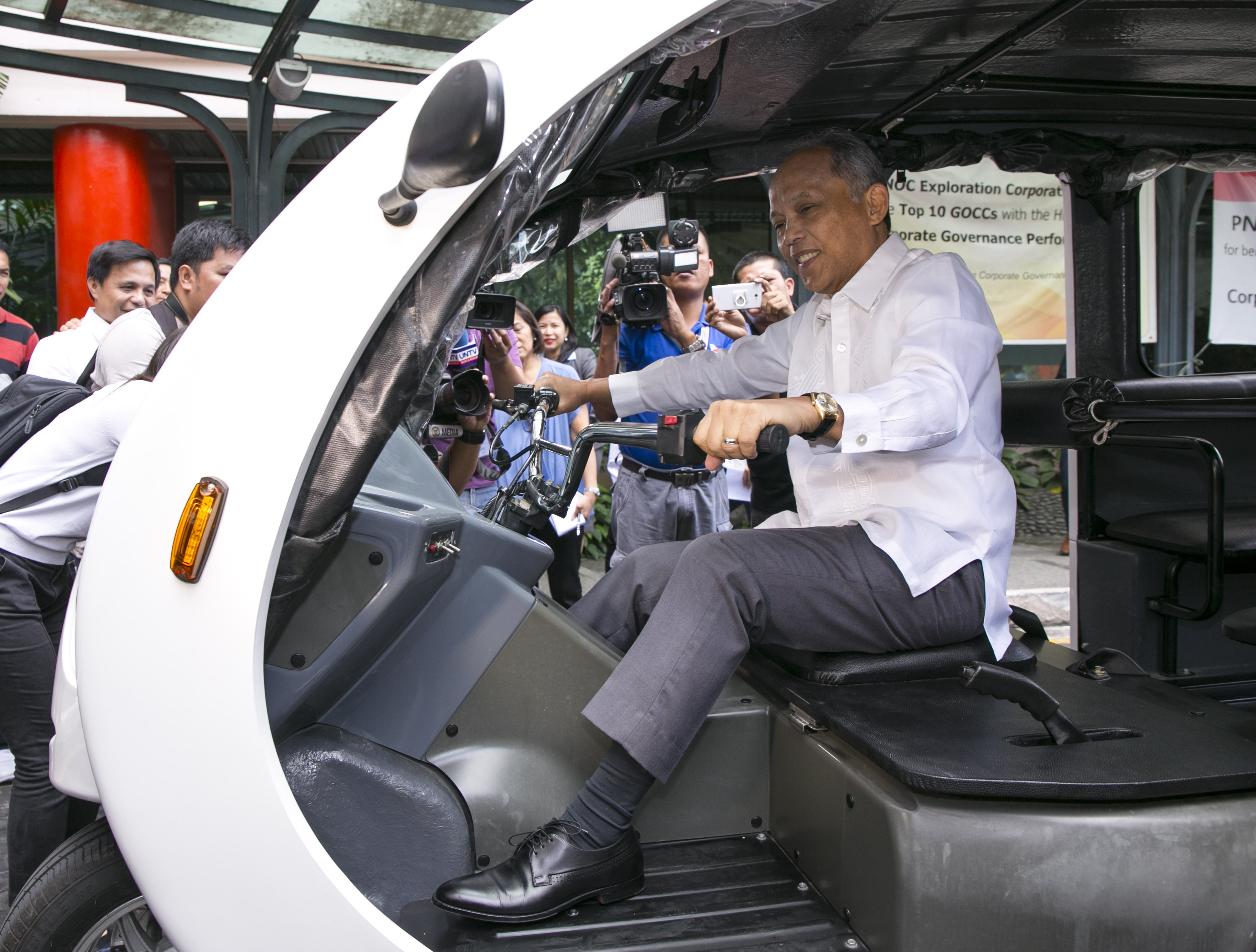 E-TRIKES for MARAWI: Energy Secretary Alfonso G. Cusi driving an energy efficient Electric Tricycle,  one of the 200 E-Trikes donated by the  DOE to Marawi through the signing of a Memorandum of Understanding today Friday at the Energy Center in BGC, Taguig City.