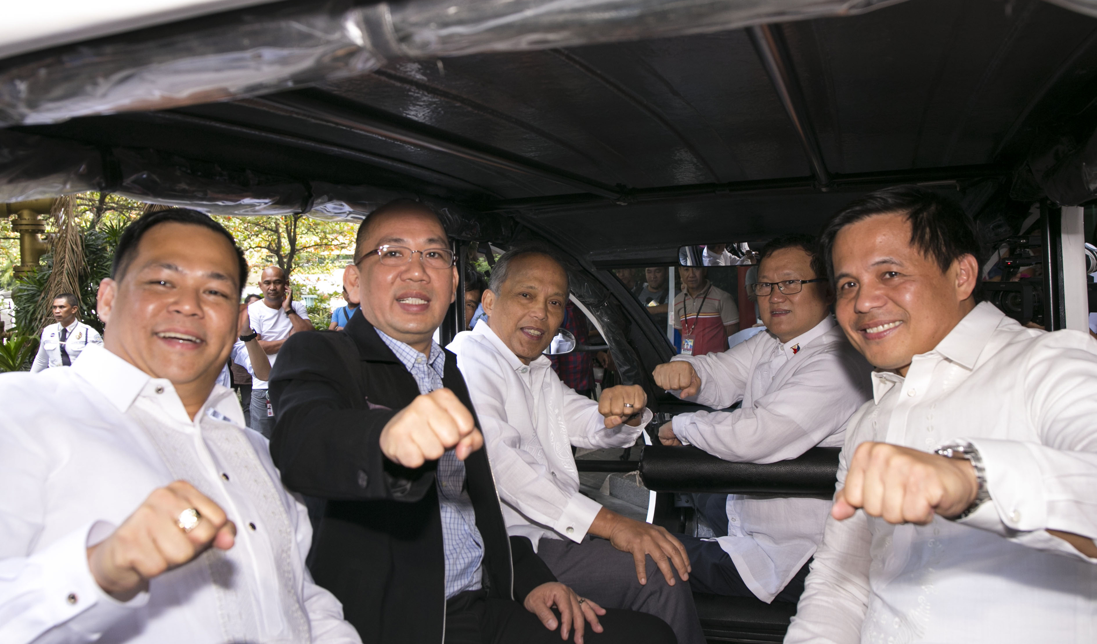 EFFICIENT RIDERS: Energy Secretary Alfonso G. Cusi (center) together with (L-R) HUDCC representative Atty. Christian Villasis, HUDCC Undersecretary and Secretary General Falconi V. Millar, Secretary Eduardo D. Del Rosario and City Mayor of Marawi Majul Gandamra in an E-Trike during its test drive at the DOE Headquarters in Taguig. The DOE and Task Force Bangon Marawi today signed the Memorandum of Understanding for the donation of 200 energy efficient E-Trikes to the local government unit of Marawi as part 