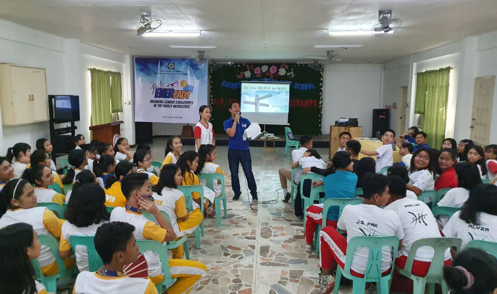 LEARNING ABOUT PETROLEUM: Engr. Dan Emmanuel M. Montealegre of the DOE-Energy Resource Development Bureau shares his knowledge about petroleum with one of the students of Batangas National Highschool. 