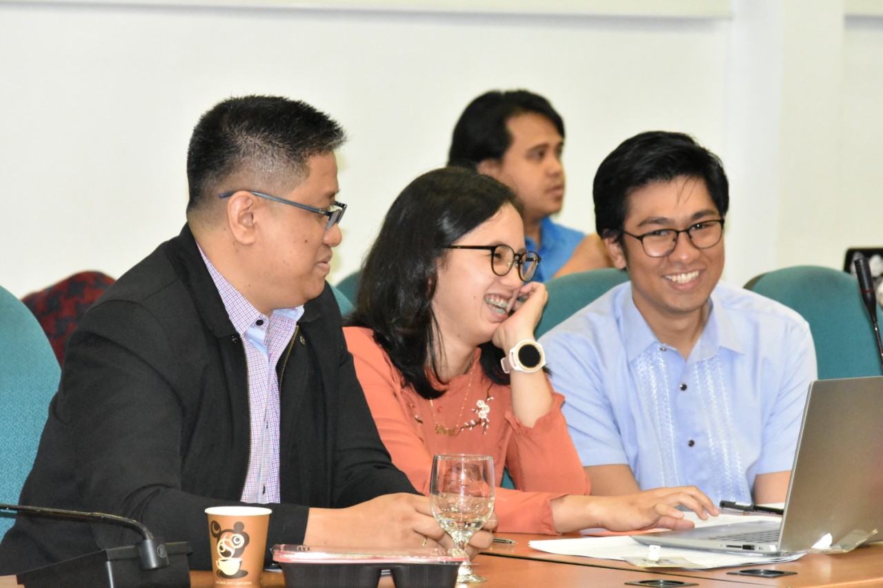 JOYFUL LEARNING: Workshop participants share a light moment while gaining technical knowledge on the Simplified Planning Took and how it could help them comply with the DOE's Renewable Portfolio Standards Rules for Off-Grid Areas. 