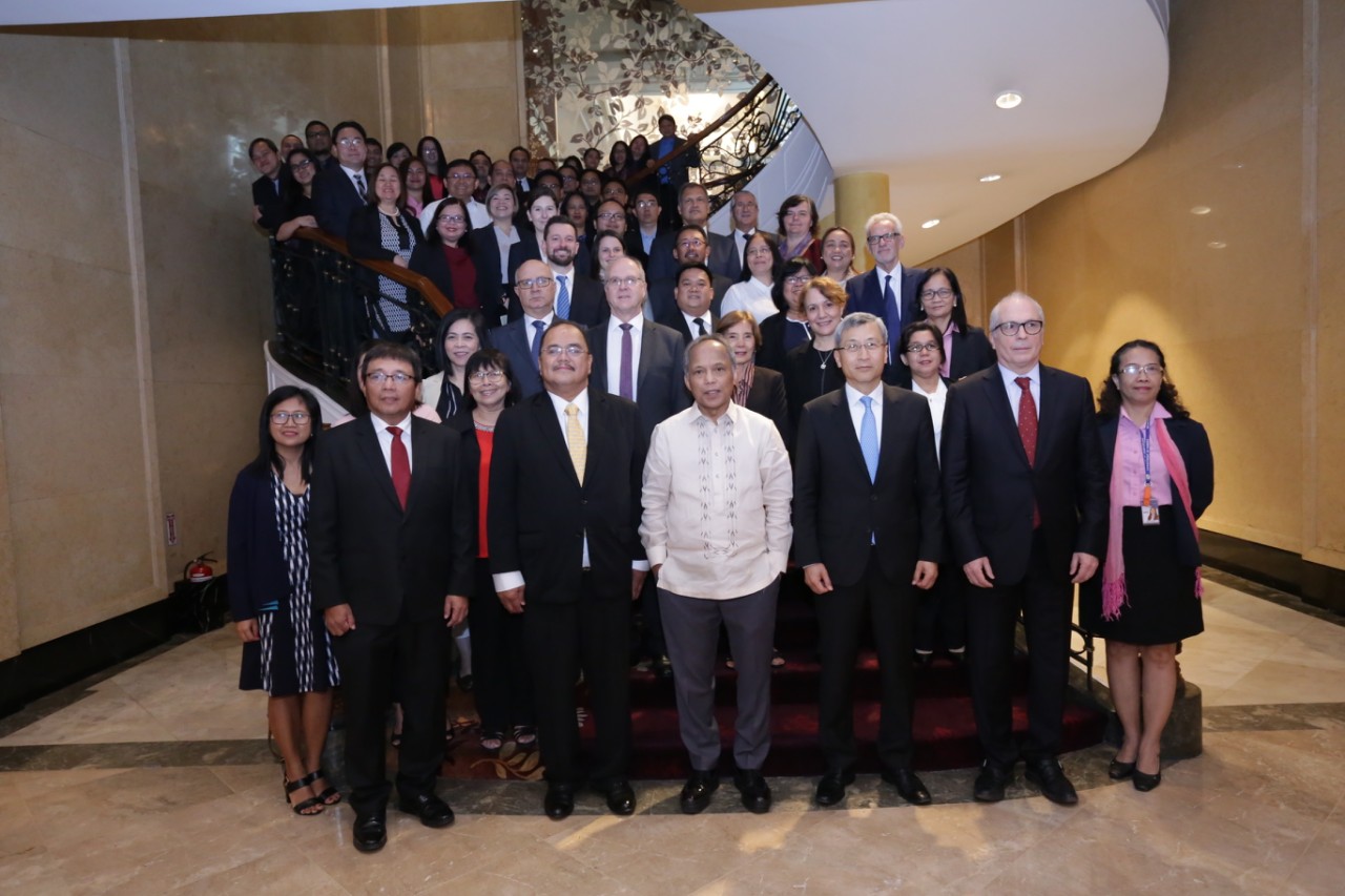 Energy Secretary Alfonso G. Cusi (center), together with International Atomic Energy Agency (IAEA) Nuclear Division Director Dohee Han and the Nuclear Energy Programme Implementing Organization (NEPIO) members headed by Undersecretary Donato D. Marcos, gather for a photo after the morning session of the Integrated Nuclear Infrastructure Review Mission held on Monday, 10 December, at the Makati Shangri-La.