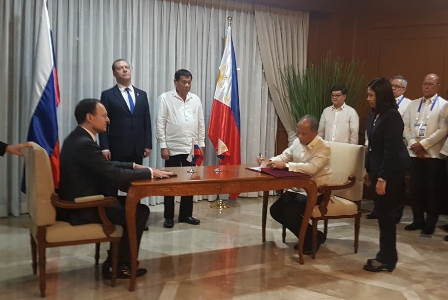 Department of Energy Secretary Alfonso Cusi and Russian Federation State Atomic Energy Corporation (Rosatom) Deputy Director General Nikolay Spassky sign a Memorandum of Cooperation (MOC) for a nuclear deal between Russia and the Philippines. The signing was witnessed by Philippine President Rodrigo Duterte and Russian Prime Minister Dmitry Medvedev.