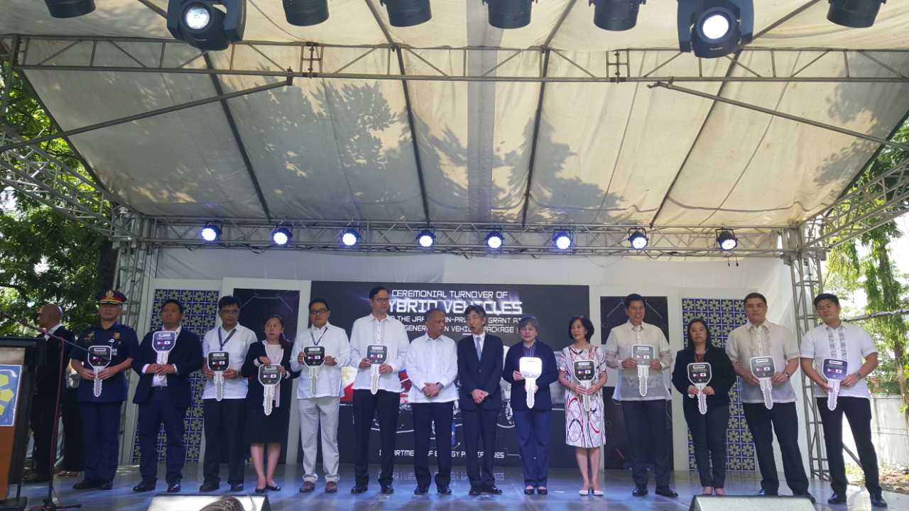 RECIPIENT OF HYBRID CARS: Through a ceremonial car key, Energy Secretary Alfonso Cusi and Japanese Ambassador to the Philippines Kazuhide Ishikawa turned over 24 units of the Toyota Prius (2017 Model) to the representatives of various national government agencies under Japan's Non-Project Grant Aid (NPGA) which funded the acquisition of the next generation vehicles (i.e., hybrid vehicles, plug-in hybrid electric vehicles and electric vehicles) that releases lower carbon emission. In photo, receiving a hybri
